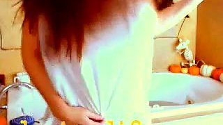 Busty curly brunette with big boobs fucks on couch