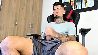 Gay latin stud jerks off his cock until he cums