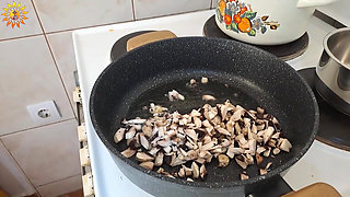 Real Homemade Video: Mila Naturist Cooks Meat with Mushrooms