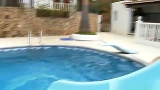 Lesbian lovers make love by the pool