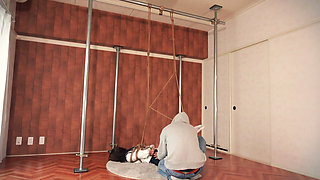 A Body Being Bound, Until the Girl Is Reduced to a Mere Sculpture.