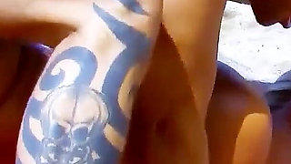 Marion is fucked anal by the camera men on the beach during a lesbian photoshoot