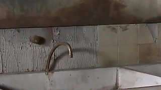 Riding his cock in a public restroom