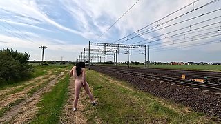 She massages her pussy all naked in public, even the train