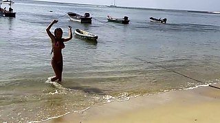 Monika Fox Poses In Pink Bikini With Stars On Beach