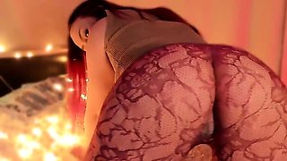 Amateur redhead Jacqueline with glasses masturbates