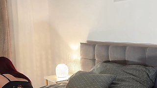 Hot redhead in her bedroom gets bored and ignored takes her panties off to show her tight shaved pussy