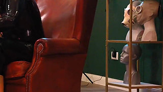 German Rubber Slut Get`s Spanked While She Is Bend Over the Knee