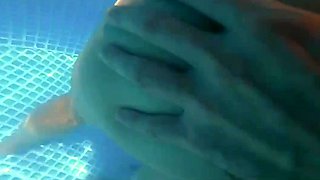 Busty milf goes skinny dipping and gets dicked down in a pool