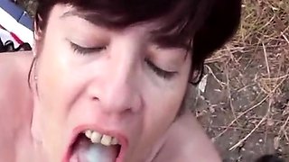 German MILF Jessy Blows a Big Cock in Public