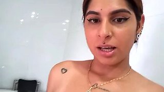 Couple masturbating in the bathroom