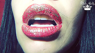 Red lips with golden glitter
