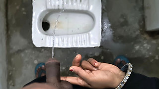 Desi Bhabhi Holding Stepbrother-in-law's Penis and Making Him Pee and Peeing Herself