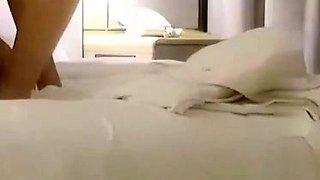 Small titted brunette teen fingering on the bed