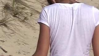 Lovely 18 Year Brunette Sunbathes Naked on the Beach