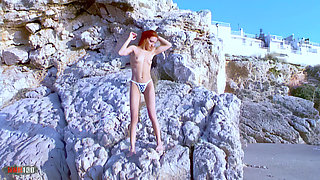 Angie Kiss: Pornstar Petite Redhead Angie Kiss Getting Naked on the Beach
