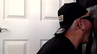 Homemade gloryhole BJ gaydaddy sucks dong through hole