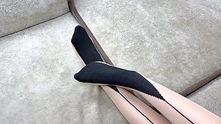 Solo Caressing Long Legs in Black Nylon Pantyhose