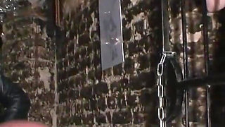 Slaves fuck in a cage