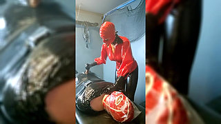 Extreme Breathplay on Mummified Slave in Latex