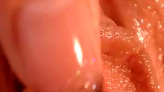 Close up of hot pink wet pussy and clit