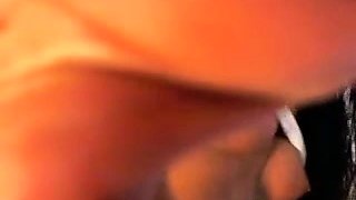 Brunette enjoys the toy on gaping pussy while masturbating
