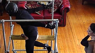 Whipped on Wooden Bondage