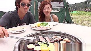 Japanese girlfriend blows her guy outdoors