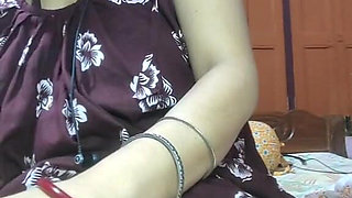 Desi Bhabhi Shows Her Pussy While Lying on the Bed