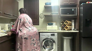 Ebony MILF Moaning and Stripteasing in Kitchen