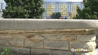 Watch This Babe Piss In Public