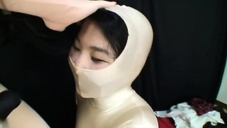 Latex babe filled up by two studs in their labratory