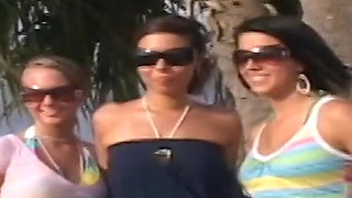 Three Hotties Play Naked on a Public Beach