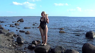 Teasing and Rinsing Her Pussy in the Lake.