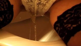 Toilet Pissing Through Lace