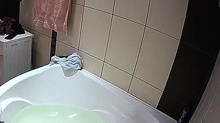 Sexy black amateur caught taking a shower on hidden cam