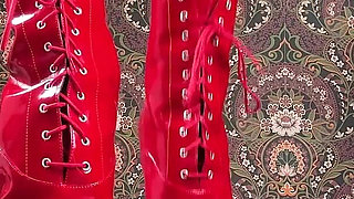 Red Ballet Boots on Wooden Floor