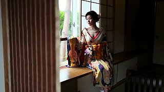 Japanese babe and a cucumber in masturbation fun