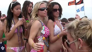 Appreciative cowgirl with big ass in bikini dancing in the beach party outdoor